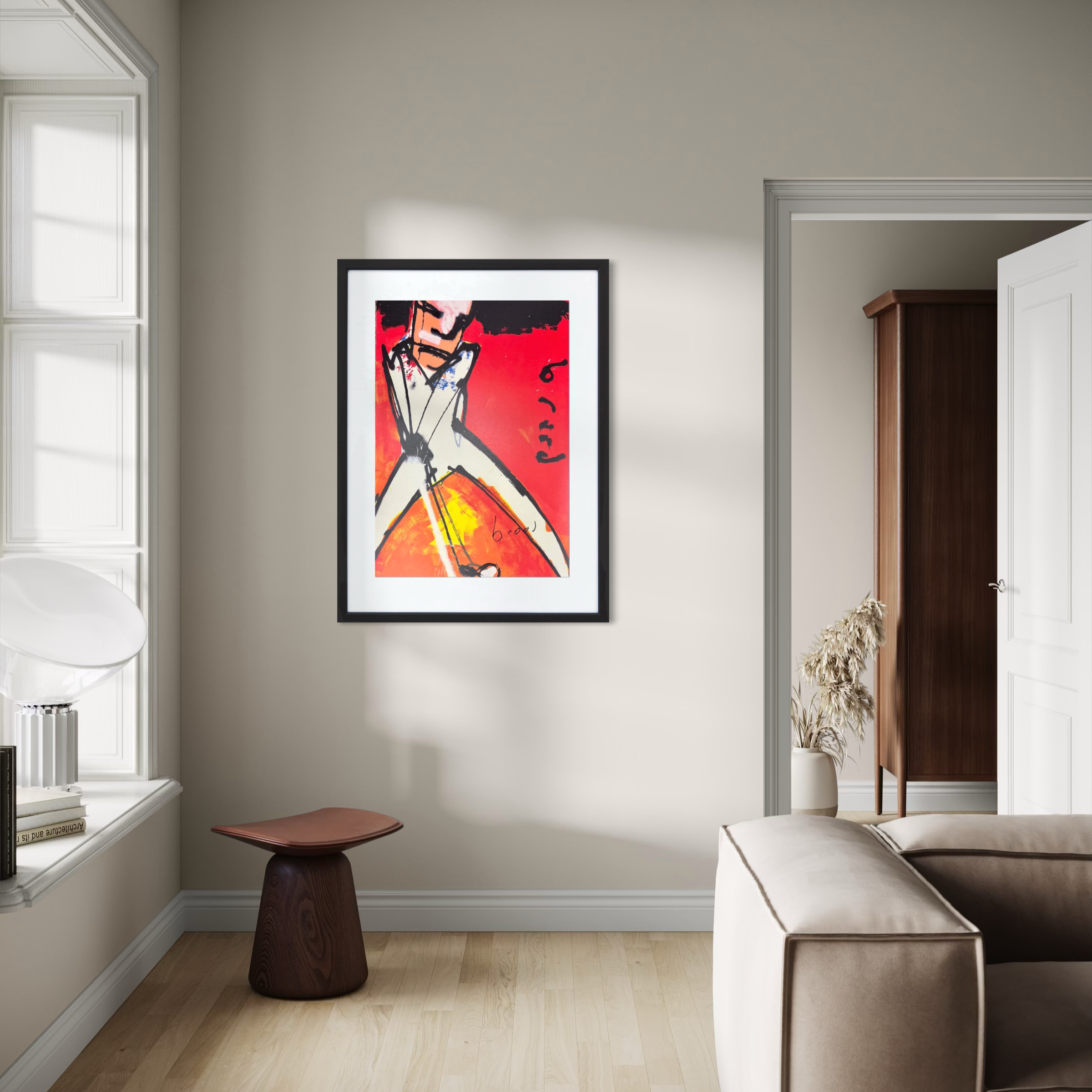 Een Herman Brood Zeefdruk Golfer aan de muur in een woonkamer.