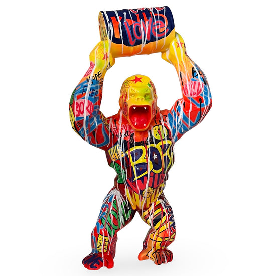 Sculpture of King Kong with a barrel painted with graffiti by Van Apple Art via modernekunst